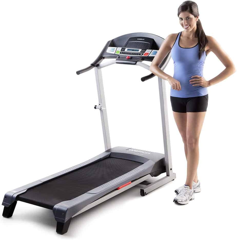 A lady stands by the Weslo Cadence G 5.9 Treadmill