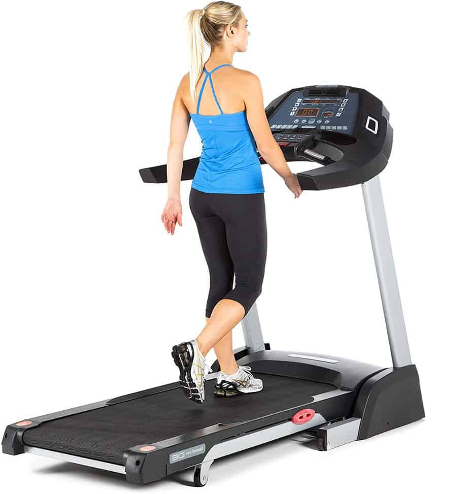 A lady running on the 3G Cardio Pro Runner Treadmill