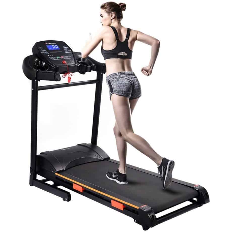 A lady is jogging on the Goplus 1000W Folding Electric Treadmill