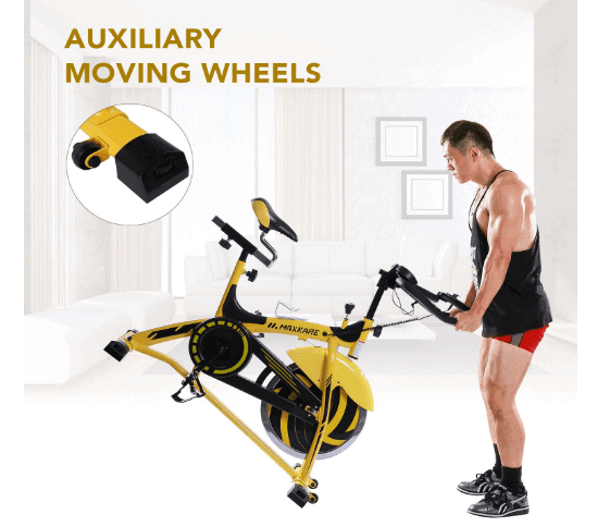 MaxKare Stationary Cycling Spin Bike is being moved to another location by a man