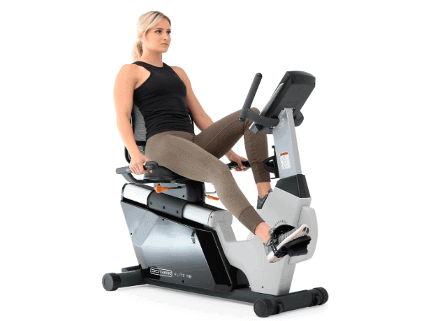 A lady riding the 3G Cardio Elite RB Recumbent Bike