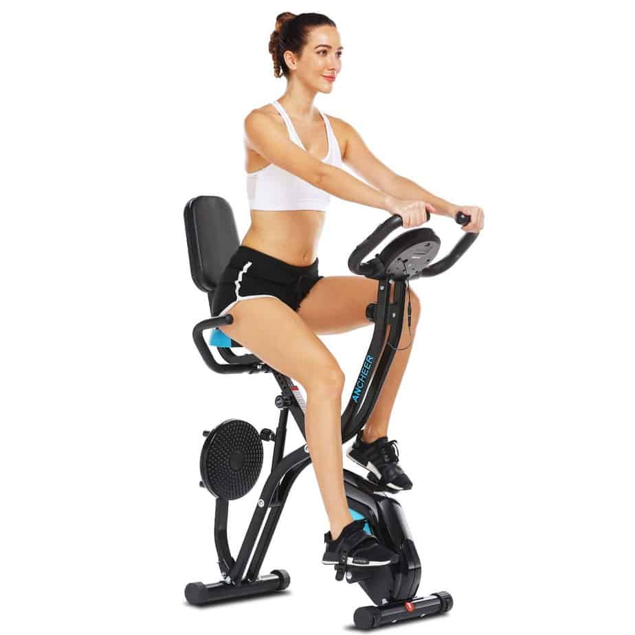 A lady exercising with the Zafuar 3-in-1 Slim Folding Cycling Exercise Bike