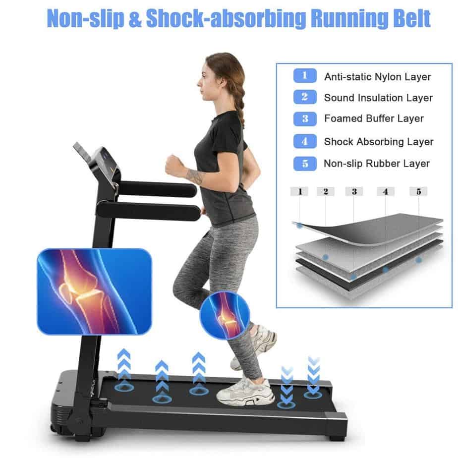 A lady is jogging on the Goplus Electric Folding Treadmill