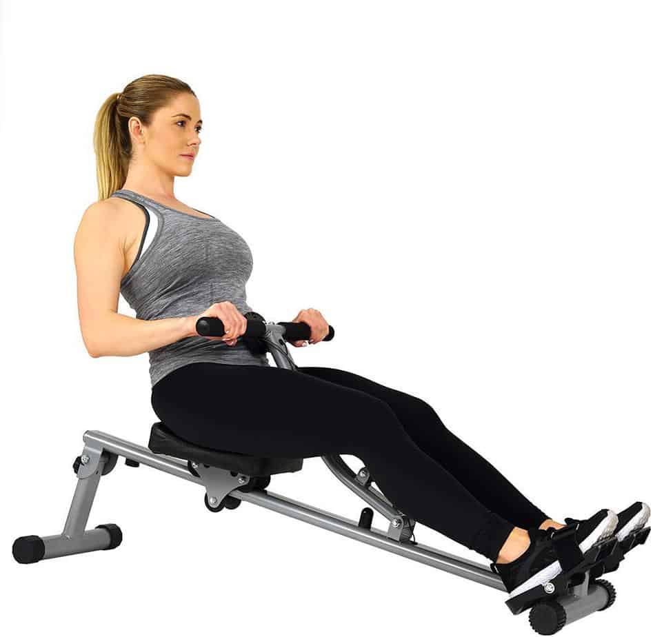 A lady is rowing on the Sunny Health and Fitness SF-RW1205