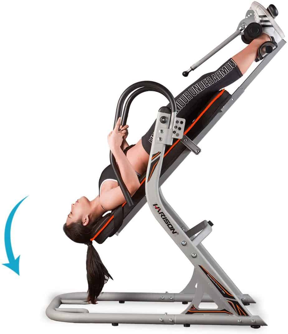 A lady exercising on the HARISON 407 Inversion Table