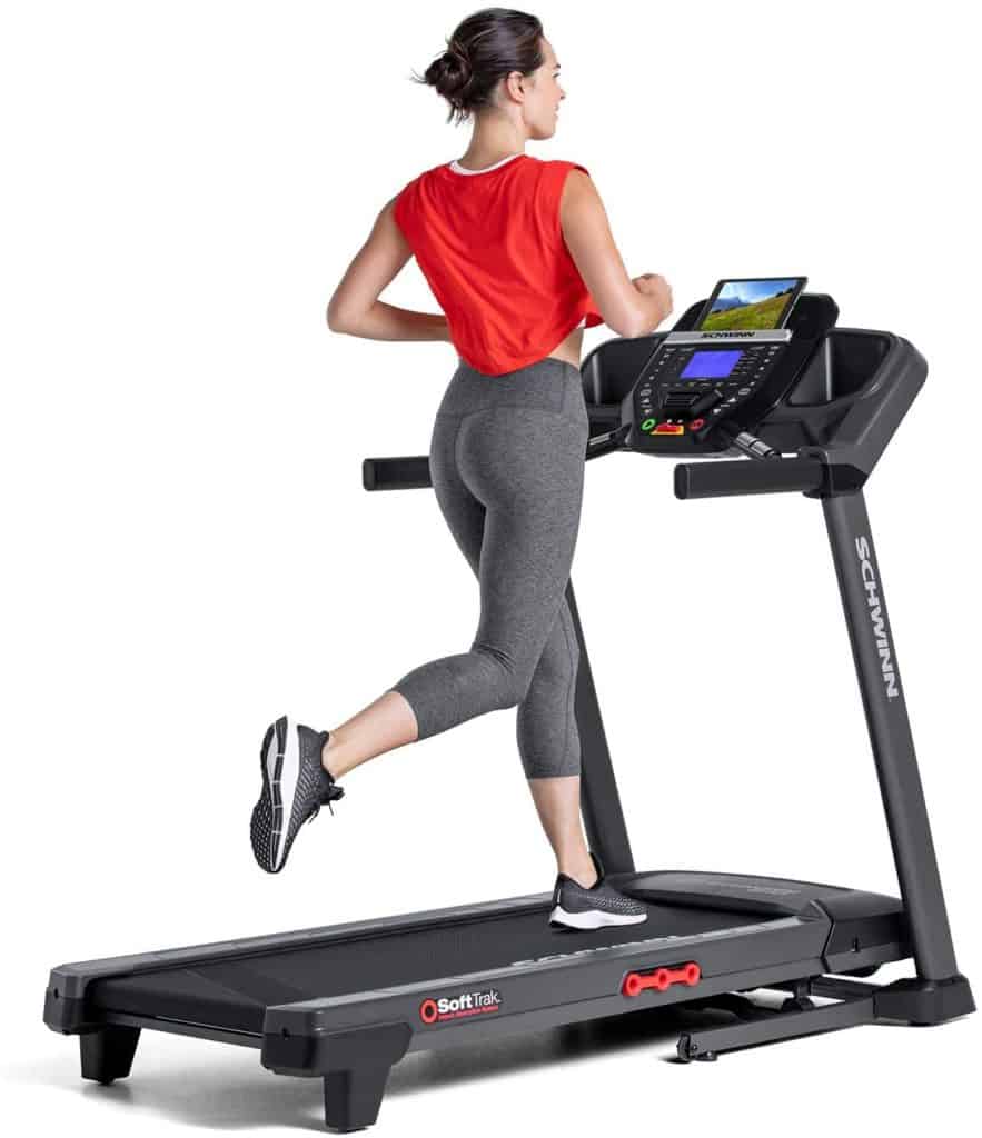 A lady is running on the Schwinn 810 Treadmill Model 100799