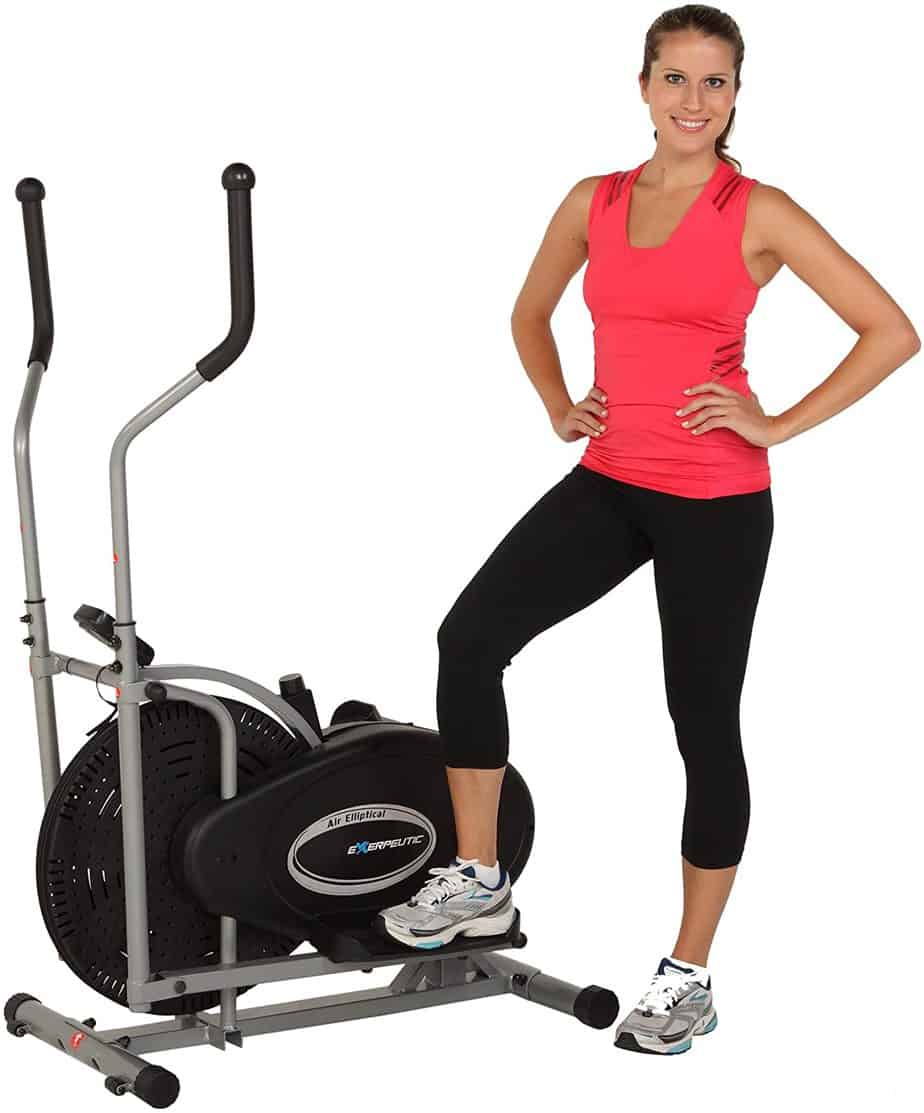 A lady standing by the Exerpeutic Aero Air Elliptical