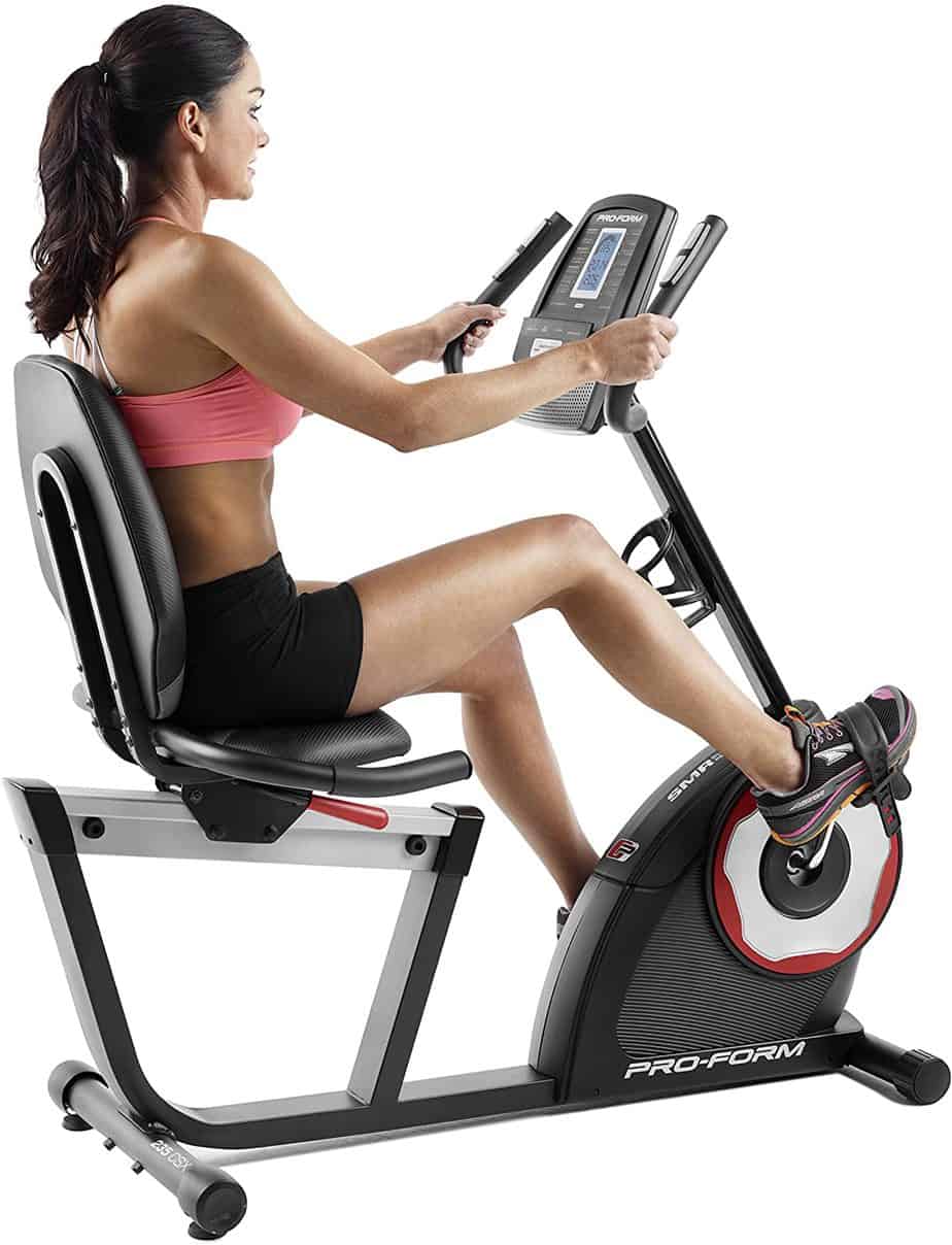 A lady exersing with the ProForm 235 CSX Recumbent Exercise Bike
