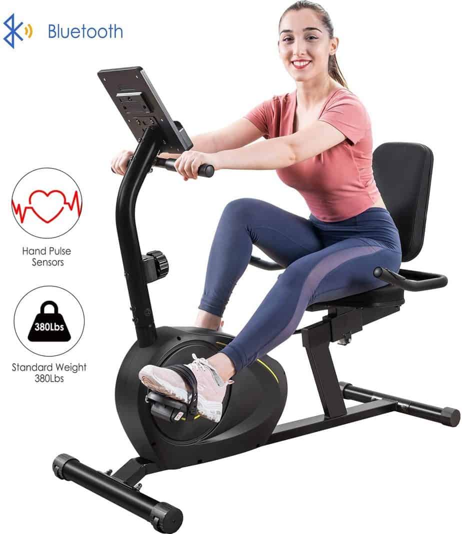 A lady is riding the DuraB Recumbent Exercise Bike