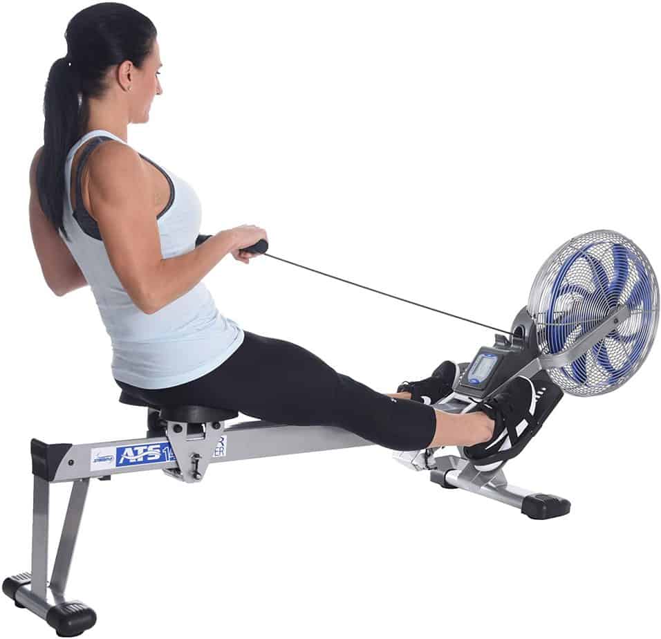 A lady is using the Stamina ATS 35-1405 Air Rower