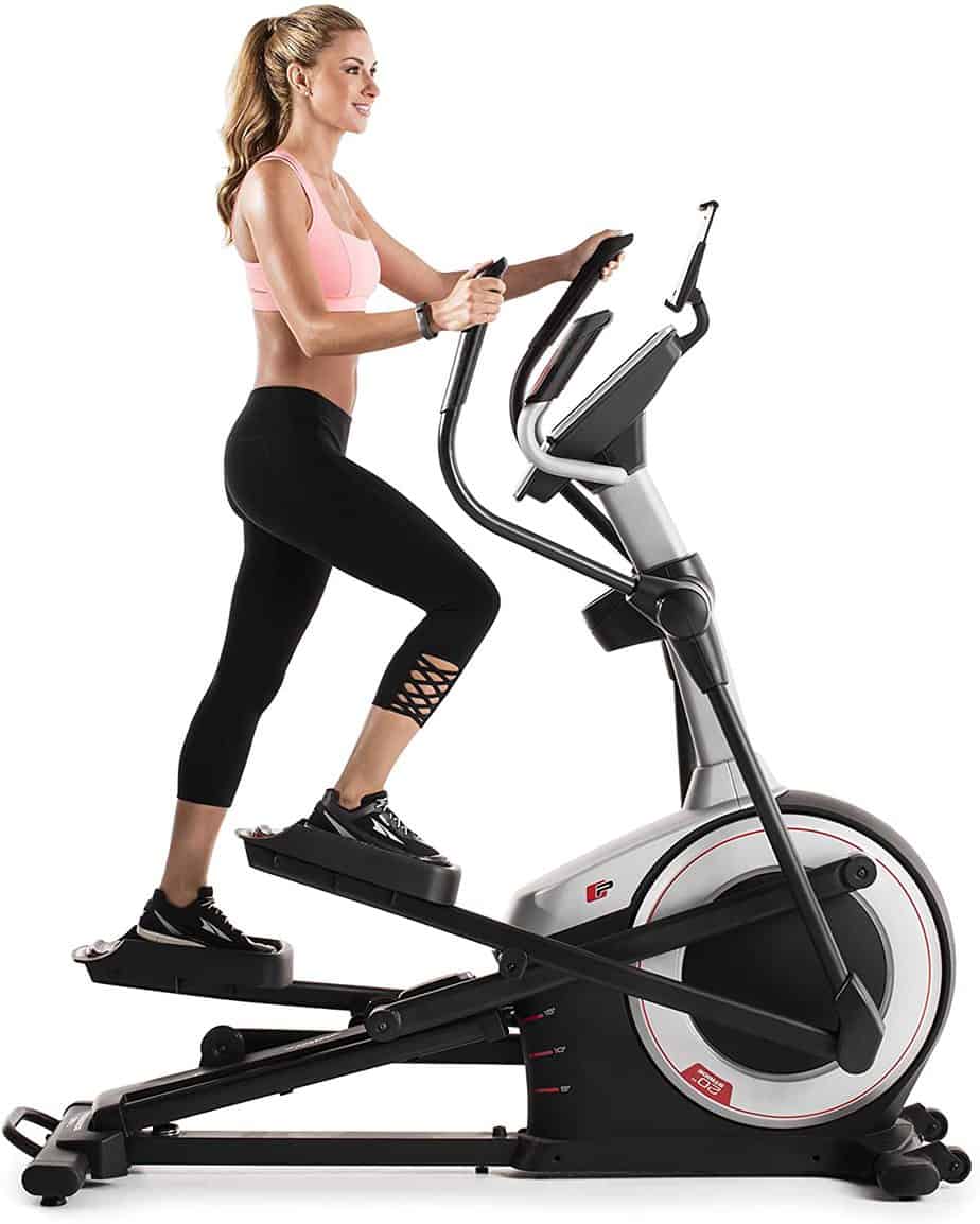 A lady is riding on the ProForm Endurance 520 E Elliptical Trainer