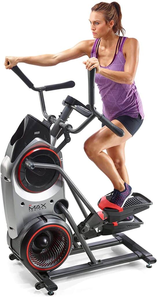 A lady exercising on the the Bowflex Max Trainer M5