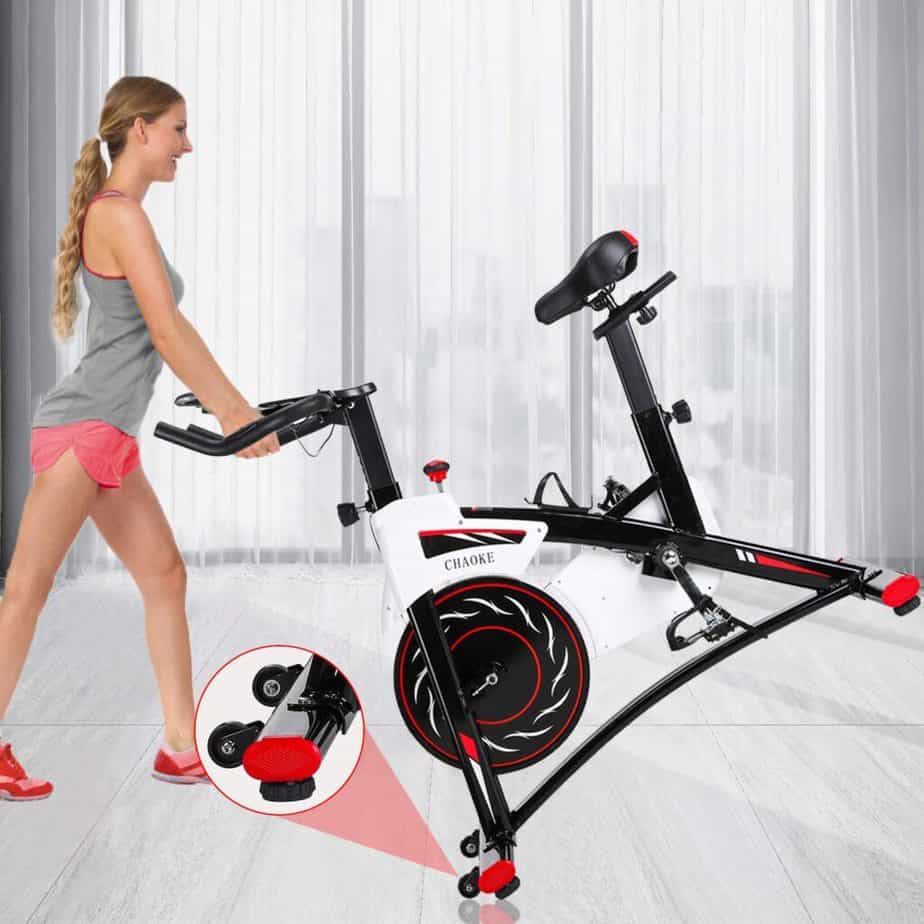 The CHAOKE 8733 Indoor magnetic Exercise Bike is being moved for storage