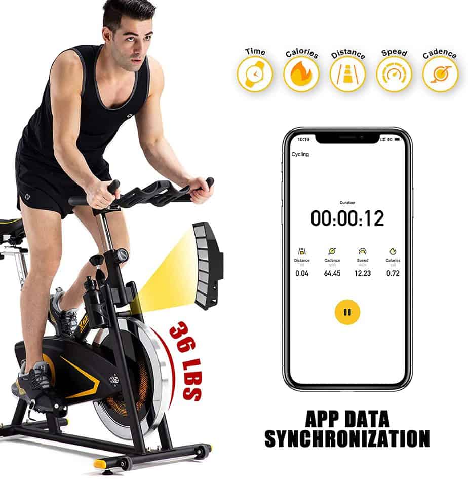 A man rides the XGEAR Magnetic Indoor Exercise Bike while standing
