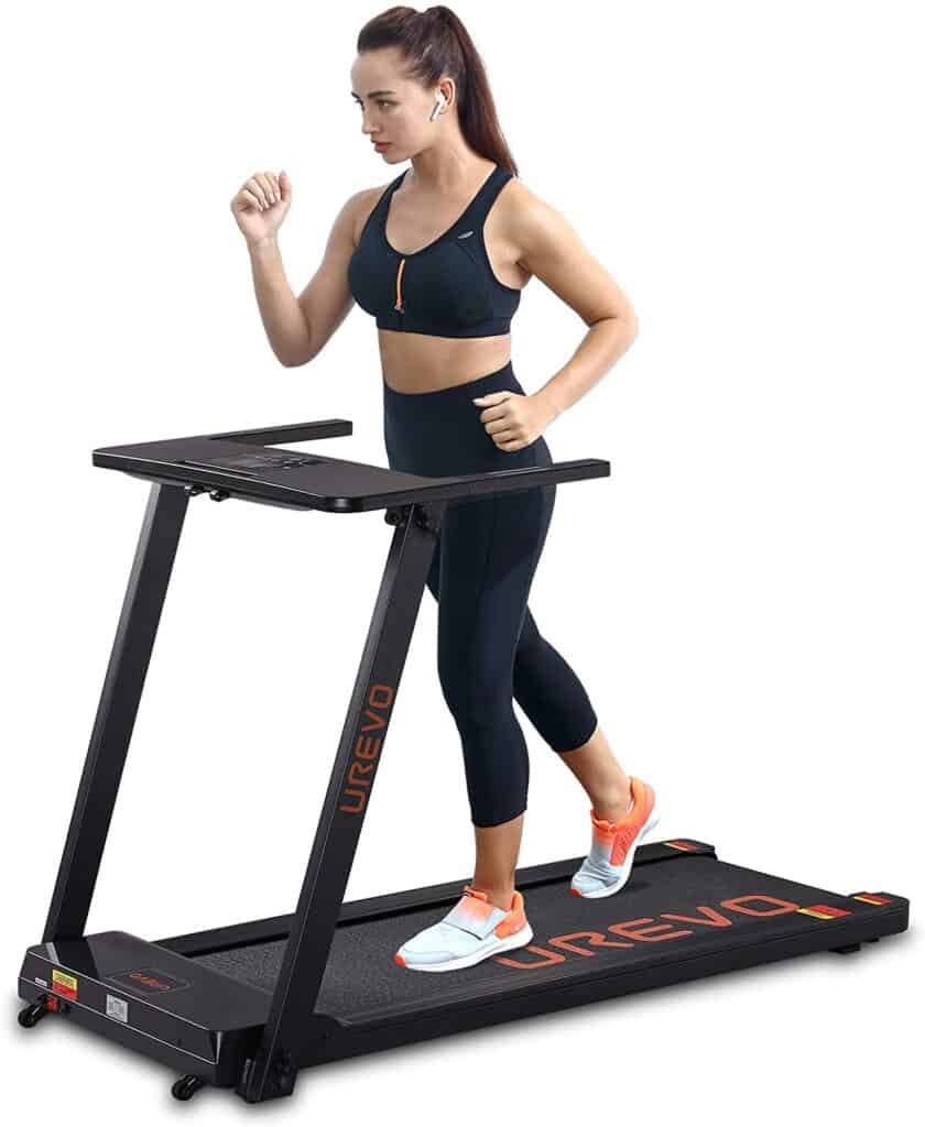A lady jogs on the UREVO Foldable Under-Desk 2.5 HP Treadmill