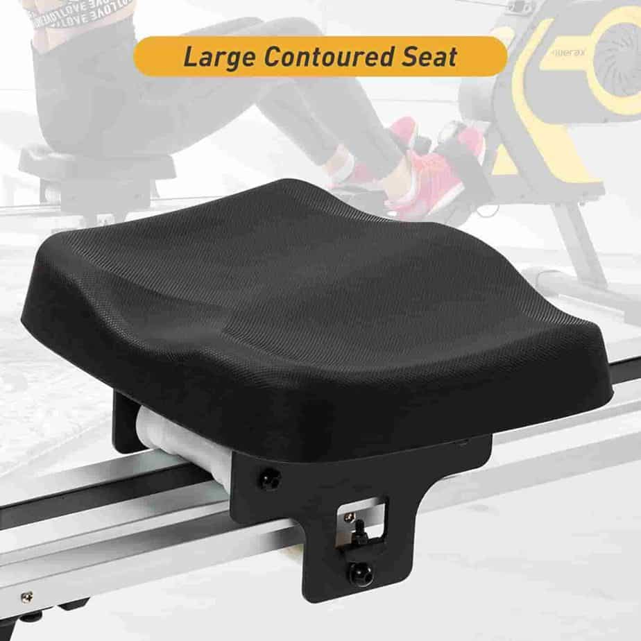 The padded and contoured seat of the Merax Folding Magnetic Rowing Machine 