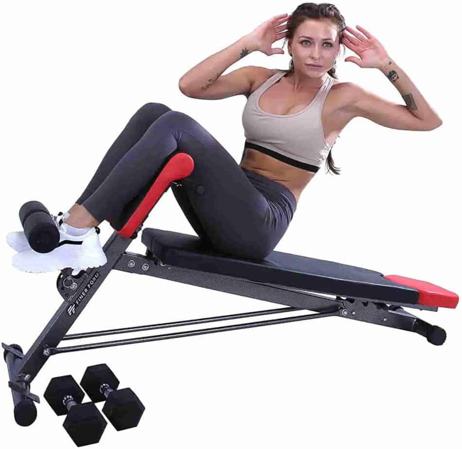 A lady performs the sit-up and twist on the FINER FORM Multi-Functional Weight Bench