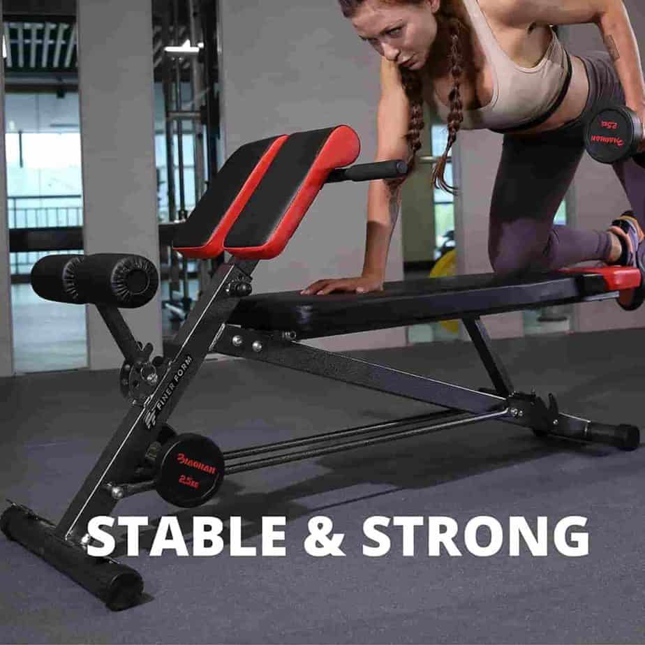 A lady does the single arm row on the FINER FORM Multi-Functional Weight Bench