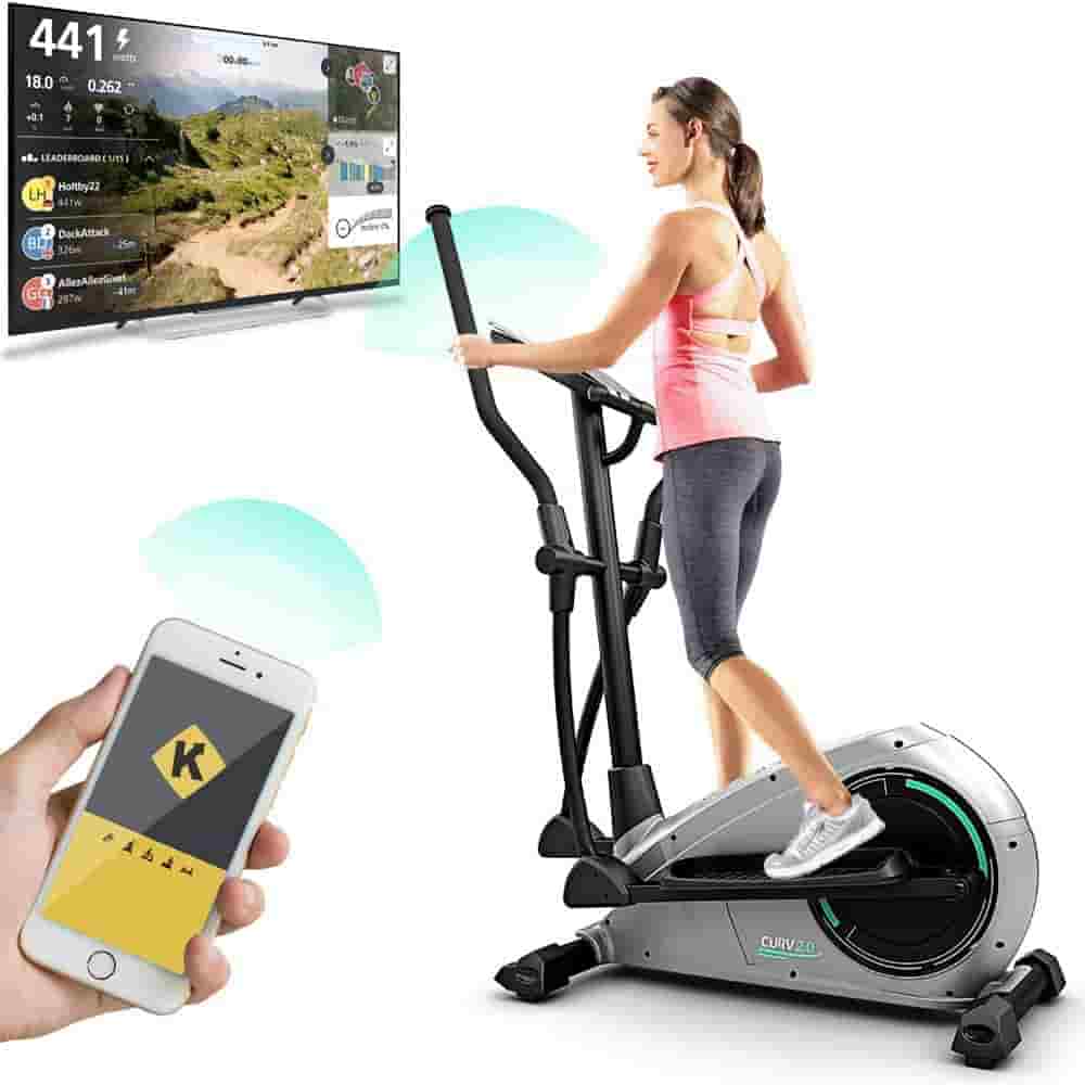 This lady exercises on the Bluefin Fitness CURV 2.0 Elliptical Cross Trainer
