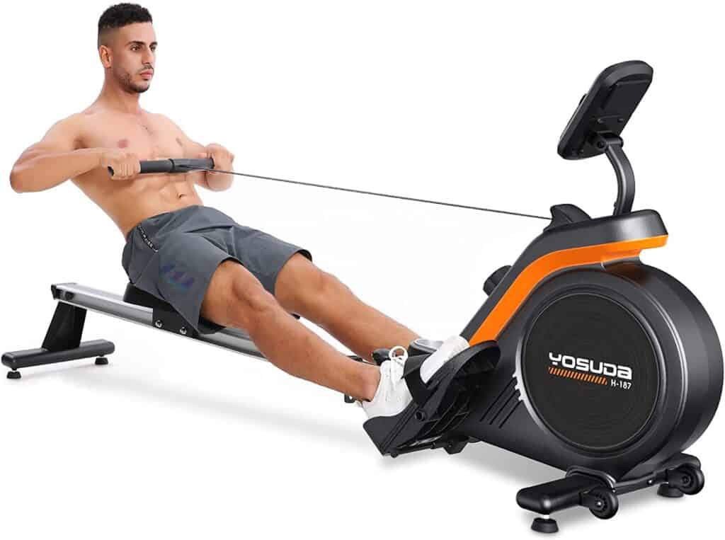 A man exercises with the Yosuda H-187 Pro Magnetic Rowing Machine