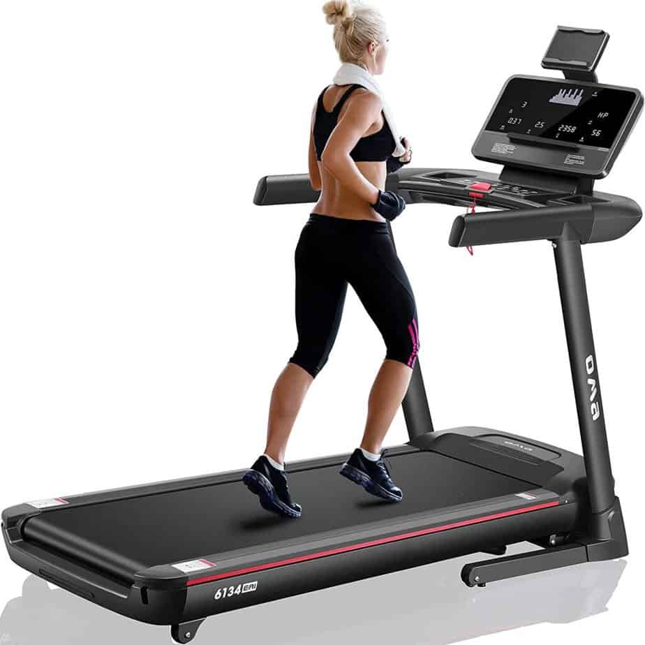 A lady runs on the OMA 6134EAI Folding Treadmill