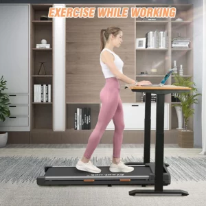 A lady works out on the Elseluck 2-in-1 Under-Desk Treadmill while working on a desk