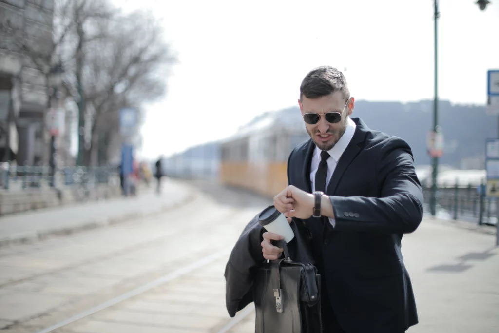 A man in a suit rushes to work