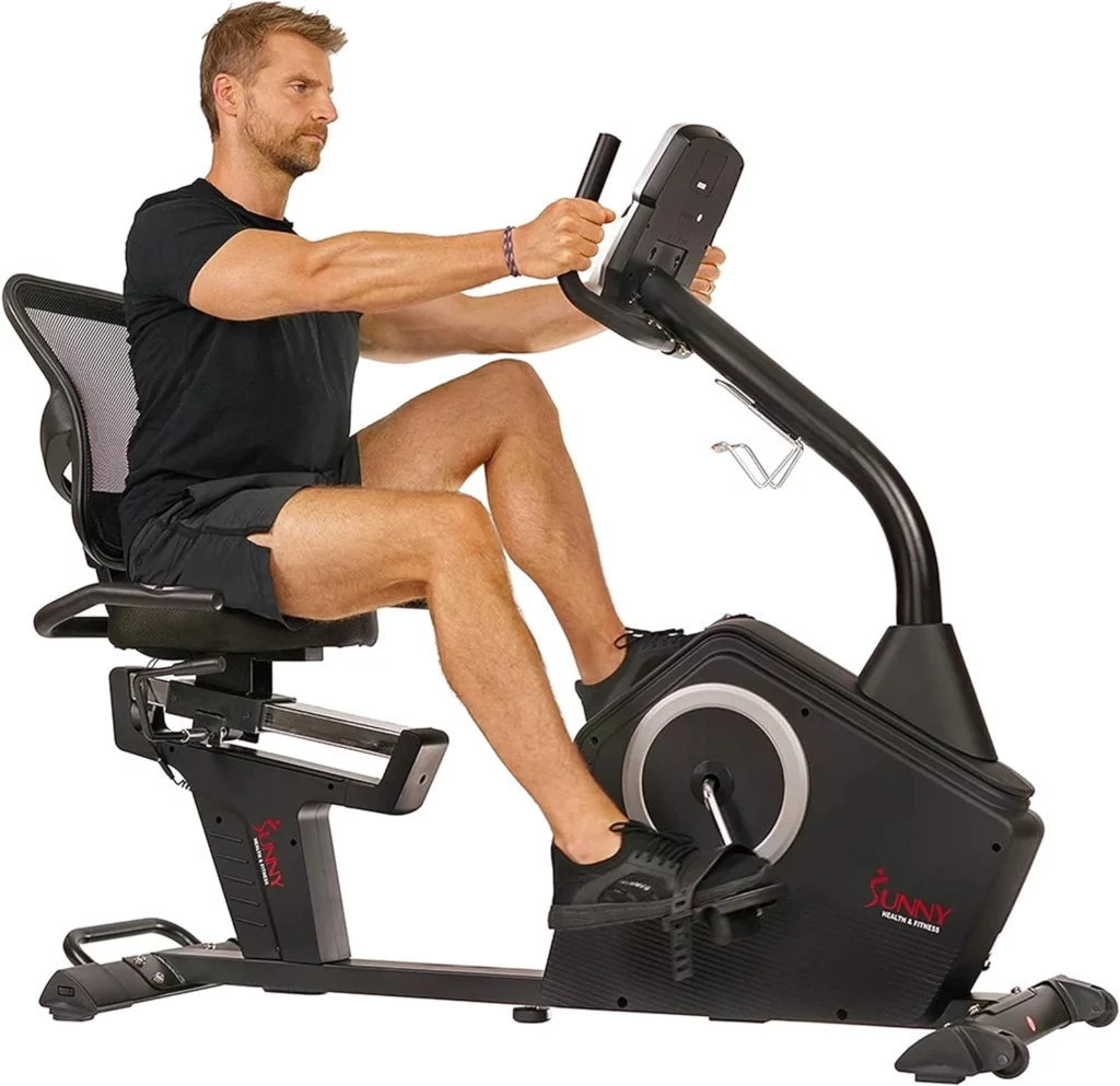 A man works out with the Sunny Health & Fitness SF-RB4850 Recumbent Bike