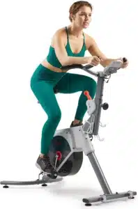 A lady exercises with the Sunny Health & Fitness SF-B122061 Cycling Bike