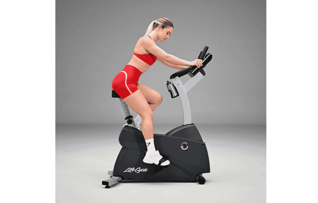 A woman exercises on the Life Fitness C1 Upright Bike